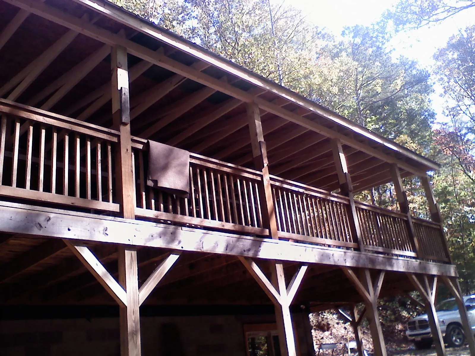Timber framing under a new elevated porch and deck — Roof Leak Repair in Harbor City by Roofing Brothers